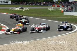 12.07.2009 Nürburg, Germany,  Fernando Alonso (ESP), Renault F1 Team, Adrian Sutil (GER), Force India F1 Team, Kazuki Nakajima (JPN), Williams F1 Team - Formula 1 World Championship, Rd 9, German Grand Prix, Sunday Race