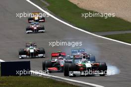 12.07.2009 Nürburg, Germany,  Adrian Sutil (GER), Force India F1 Team, Heikki Kovalainen (FIN), McLaren Mercedes - Formula 1 World Championship, Rd 9, German Grand Prix, Sunday Race