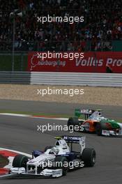 12.07.2009 Nürburg, Germany,  Nick Heidfeld (GER), BMW Sauber F1 Team and Giancarlo Fisichella (ITA), Force India F1 Team - Formula 1 World Championship, Rd 9, German Grand Prix, Sunday Race