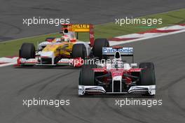 12.07.2009 Nürburg, Germany,  Timo Glock (GER), Toyota F1 Team , Fernando Alonso (ESP), Renault F1 Team - Formula 1 World Championship, Rd 9, German Grand Prix, Sunday Race
