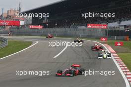 12.07.2009 Nürburg, Germany,  Heikki Kovalainen (FIN), McLaren Mercedes and Jenson Button (GBR), Brawn GP, Felipe Massa (BRA), Scuderia Ferrari - Formula 1 World Championship, Rd 9, German Grand Prix, Sunday Race