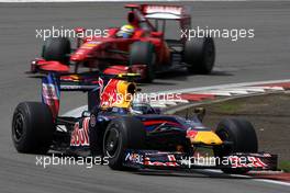 12.07.2009 Nürburg, Germany,  Sebastian Vettel (GER), Red Bull Racing, RB5 leads Felipe Massa (BRA), Scuderia Ferrari, F60 - Formula 1 World Championship, Rd 9, German Grand Prix, Sunday Race