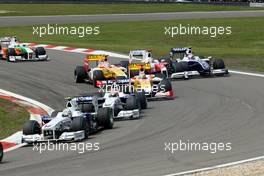 12.07.2009 Nürburg, Germany,  Jarno Trulli (ITA), Toyota Racing crashes with Kazuki Nakajima (JPN), Williams F1 Team - Formula 1 World Championship, Rd 9, German Grand Prix, Sunday Race