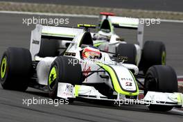 12.07.2009 Nürburg, Germany,  Rubens Barrichello (BRA), Brawn GP, BGP001, BGP 001l leads Jenson Button (GBR), Brawn GP, BGP001, BGP 001- Formula 1 World Championship, Rd 9, German Grand Prix, Sunday Race