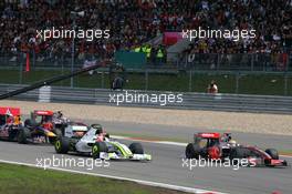12.07.2009 Nürburg, Germany,  Start of the race on 1st corner, Lewis Hamilton (GBR), McLaren Mercedes in the lead, Rubens Barrichello (BRA), Brawn GP - Formula 1 World Championship, Rd 9, German Grand Prix, Sunday Race