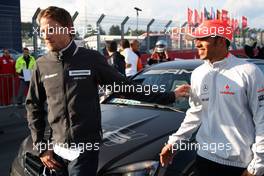 11.07.2009 Nürburg, Germany,  Jenson Button (GBR), Brawn GP, Lewis Hamilton (GBR), McLaren Mercedes - Formula 1 World Championship, Rd 9, German Grand Prix, Saturday