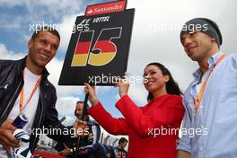 12.07.2009 Nürburg, Germany,  Lukas Podolski (soccer player) - Formula 1 World Championship, Rd 9, German Grand Prix, Sunday