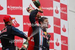 12.07.2009 Nürburg, Germany,  Podium, Sebastian Vettel (GER), Red Bull Racing and Mark Webber (AUS), Red Bull Racing - Formula 1 World Championship, Rd 9, German Grand Prix, Sunday