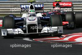 24.07.2009 Budapest, Hungary,  Nick Heidfeld (GER), BMW Sauber F1 Team and Heikki Kovalainen (FIN), McLaren Mercedes  - Formula 1 World Championship, Rd 10, Hungarian Grand Prix, Friday Practice