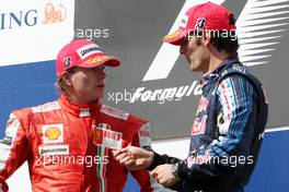 26.07.2009 Budapest, Hungary,  Kimi Raikkonen (FIN), Räikkönen, Scuderia Ferrari, Mark Webber (AUS), Red Bull Racing - Formula 1 World Championship, Rd 10, Hungarian Grand Prix, Sunday Podium