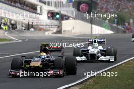 26.07.2009 Budapest, Hungary,  Sébastien Buemi (SUI), Scuderia Toro Rosso, Nick Heidfeld (GER), BMW Sauber F1 Team - Formula 1 World Championship, Rd 10, Hungarian Grand Prix, Sunday Race
