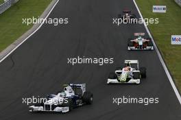 26.07.2009 Budapest, Hungary,  Nick Heidfeld (GER), BMW Sauber F1 Team, Rubens Barrichello (BRA), Brawn GP - Formula 1 World Championship, Rd 10, Hungarian Grand Prix, Sunday Race