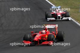 26.07.2009 Budapest, Hungary,  Kimi Raikkonen (FIN), Räikkönen, Scuderia Ferrari, Timo Glock (GER), Toyota F1 Team - Formula 1 World Championship, Rd 10, Hungarian Grand Prix, Sunday Race