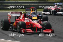 26.07.2009 Budapest, Hungary,  Kimi Raikkonen (FIN), Räikkönen, Scuderia Ferrari and Mark Webber (AUS), Red Bull Racing  - Formula 1 World Championship, Rd 10, Hungarian Grand Prix, Sunday Race