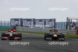 26.07.2009 Budapest, Hungary,  Lewis Hamilton (GBR), McLaren Mercedes overtakes Mark Webber (AUS), Red Bull Racing  - Formula 1 World Championship, Rd 10, Hungarian Grand Prix, Sunday Race