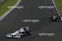 26.07.2009 Budapest, Hungary,  Robert Kubica (POL),  BMW Sauber F1 Team and Sébastien Buemi (SUI), Scuderia Toro Rosso - Formula 1 World Championship, Rd 10, Hungarian Grand Prix, Sunday Race