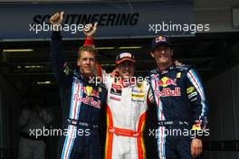 25.07.2009 Budapest, Hungary,  2nd position for Sebastian Vettel (GER), Red Bull Racing, pole for Fernando Alonso (ESP), Renault F1 Team and 3rd for Mark Webber (AUS), Red Bull Racing - Formula 1 World Championship, Rd 10, Hungarian Grand Prix, Saturday Qualifying