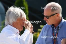 26.07.2009 Budapest, Hungary,  Bernie Ecclestone (GBR), President and CEO of Formula One Management talking with Dr Gary Hartstein (USA), FIA Medical Delegate - Formula 1 World Championship, Rd 10, Hungarian Grand Prix, Sunday