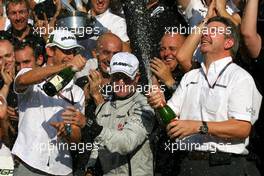 13.09.2009 Monza, Italy,  Jenson Button (GBR), Brawn GP, Ross Brawn (GBR) Team Principal, Brawn GP and Rubens Barrichello (BRA), Brawn GP - Formula 1 World Championship, Rd 13, Italian Grand Prix, Sunday Podium