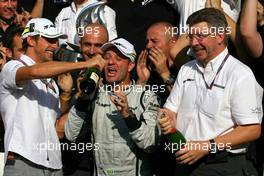 13.09.2009 Monza, Italy,  Jenson Button (GBR), Brawn GP, Ross Brawn (GBR) Team Principal, Brawn GP and Rubens Barrichello (BRA), Brawn GP - Formula 1 World Championship, Rd 13, Italian Grand Prix, Sunday Podium
