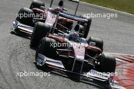 13.09.2009 Monza, Italy,  Jarno Trulli (ITA), Toyota F1 Team and Timo Glock (GER), Toyota F1 Team  - Formula 1 World Championship, Rd 13, Italian Grand Prix, Sunday Race