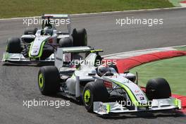 13.09.2009 Monza, Italy,  Rubens Barrichello (BRA), BrawnGP, BGP001 leads Jenson Button (GBR), BrawnGP, BGP001 - Formula 1 World Championship, Rd 13, Italian Grand Prix, Sunday Race