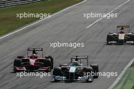 13.09.2009 Monza, Italy,  Sebastian Vettel (GER), Red Bull Racing and Kimi Raikkonen (FIN), Räikkönen, Scuderia Ferrari  - Formula 1 World Championship, Rd 13, Italian Grand Prix, Sunday Race