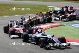 13.09.2009 Monza, Italy,  Nico Rosberg (GER), WilliamsF1 Team, FW31, Jarno Trulli (ITA), Toyota Racing, TF109 - Formula 1 World Championship, Rd 13, Italian Grand Prix, Sunday Race