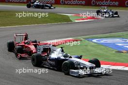 13.09.2009 Monza, Italy,  Nick Heidfeld (GER), BMW Sauber F1 Team, F1.09 leads Kimi Raikkonen (FIN), Räikkönen, Scuderia Ferrari - Formula 1 World Championship, Rd 13, Italian Grand Prix, Sunday Race