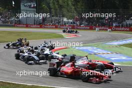 13.09.2009 Monza, Italy,  Giancarlo Fisichella (ITA), Scuderia Ferrari and Jarno Trulli (ITA), Toyota Racing, TF109 - Formula 1 World Championship, Rd 13, Italian Grand Prix, Sunday Race