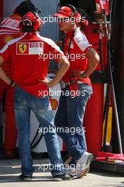 12.09.2009 Monza, Italy,  Luca Badoer (ITA), Test Driver, Scuderia Ferrari  and Michael Schumacher (GER), Test Driver, Scuderia Ferrari  - Formula 1 World Championship, Rd 13, Italian Grand Prix, Saturday Qualifying