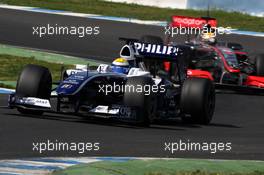 16.03.2009 Jerez, Spain,  Nico Rosberg (GER), WilliamsF1 Team, FW31, Lewis Hamilton (GBR), McLaren Mercedes, MP4-24 - Formula 1 Testing, Jerez