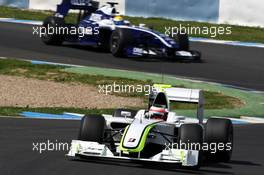 16.03.2009 Jerez, Spain,  Rubens Barrichello (BRA), BrawnGP, Brawn GP, BGP001, BGP 001, Nico Rosberg (GER), WilliamsF1 Team, FW31 - Formula 1 Testing, Jerez