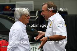 02.10.2009 Suzuka, Japan,  Bernie Ecclestone (GBR), President and CEO of Formula One Management talking with Jean-Francois Caubet (FRA), Managibng director of Renault F1  - Formula 1 World Championship, Rd 15, Japanese Grand Prix, Friday
