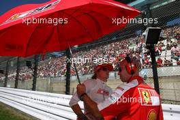 04.10.2009 Suzuka, Japan,  Kimi Raikkonen (FIN), Räikkönen, Scuderia Ferrari, F60 - Formula 1 World Championship, Rd 15, Japanese Grand Prix, Sunday Pre-Race Grid