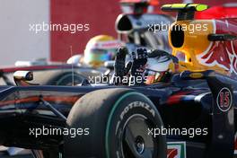 04.10.2009 Suzuka, Japan,  Sebastian Vettel (GER), Red Bull Racing and Lewis Hamilton (GBR), McLaren Mercedes  - Formula 1 World Championship, Rd 15, Japanese Grand Prix, Sunday Podium