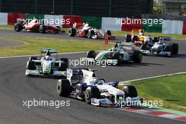 04.10.2009 Suzuka, Japan,  Nick Heidfeld (GER), BMW Sauber F1 Team leads Rubens Barrichello (BRA), BrawnGP - Formula 1 World Championship, Rd 15, Japanese Grand Prix, Sunday Race
