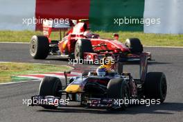 04.10.2009 Suzuka, Japan,  Mark Webber (AUS), Red Bull Racing leads Kimi Raikkonen (FIN), Räikkönen, Scuderia Ferrari - Formula 1 World Championship, Rd 15, Japanese Grand Prix, Sunday Race
