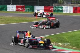 04.10.2009 Suzuka, Japan,  Sebastian Vettel (GER), Red Bull Racing leads the start of the race - Formula 1 World Championship, Rd 15, Japanese Grand Prix, Sunday Race