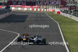 kndKazuki Nakajima (JPN), Williams F1 Team  Mark Webber (AUS), Red Bull Racing  - Formula 1 World Championship, Rd 15, Japanese Grand Prix, Sunday Race