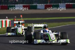 04.10.2009 Suzuka, Japan,  Rubens Barrichello (BRA), Brawn GP, BGP001, BGP 001 leads Jenson Button (GBR), Brawn GP - Formula 1 World Championship, Rd 15, Japanese Grand Prix, Sunday Race