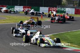 04.10.2009 Suzuka, Japan,  Jenson Button (GBR), BrawnGP leads Robert Kubica (POL),  BMW Sauber F1 Team - Formula 1 World Championship, Rd 15, Japanese Grand Prix, Sunday Race