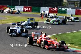04.10.2009 Suzuka, Japan,  Kimi Raikkonen (FIN), Räikkönen, Scuderia Ferrari, F60 leads Nico Rosberg (GER), WilliamsF1 Team, FW31 - Formula 1 World Championship, Rd 15, Japanese Grand Prix, Sunday Race