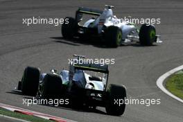 04.10.2009 Suzuka, Japan,  Jenson Button (GBR), Brawn GP and Rubens Barrichello (BRA), Brawn GP  - Formula 1 World Championship, Rd 15, Japanese Grand Prix, Sunday Race