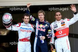 03.10.2009 Suzuka, Japan,  Jarno Trulli (ITA), Toyota Racing 2nd, Sebastian Vettel (GER), Red Bull Racing in pole position, Lewis Hamilton (GBR), McLaren Mercedes 3rd - Formula 1 World Championship, Rd 15, Japanese Grand Prix, Saturday Qualifying