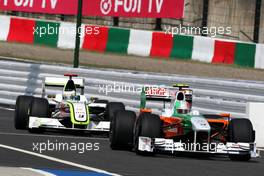 03.10.2009 Suzuka, Japan,  Vitantonio Liuzzi (ITA), Force India F1 Team leads Jenson Button (GBR), BrawnGP - Formula 1 World Championship, Rd 15, Japanese Grand Prix, Saturday Practice