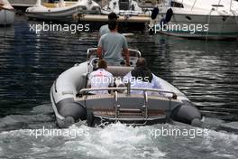 22.05.2009 Monte Carlo, Monaco,  Martin Whitmarsh (GBR), McLaren, Chief Executive Officer and Norbert Haug (GER), Mercedes, Motorsport chief on there way to the FOTA meeting on the boat of Flavio Briatore (ITA), Renault F1 Team, Team Chief, Managing Director (Force Blue) - Formula 1 World Championship, Rd 6, Monaco Grand Prix, Friday