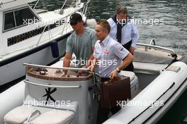 22.05.2009 Monte Carlo, Monaco,  Martin Whitmarsh (GBR), McLaren, Chief Executive Officer and Norbert Haug (GER), Mercedes, Motorsport chief going to the FOTA meeting on the boat of Flavio Briatore (ITA), Renault F1 Team, Team Chief, Managing Director (Force Blue) - Formula 1 World Championship, Rd 6, Monaco Grand Prix, Friday