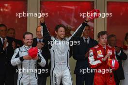 24.05.2009 Monte Carlo, Monaco,  1st place Jenson Button (GBR), Brawn GP with 2nd place Rubens Barrichello (BRA), Brawn GP and  3rd place Kimi Raikkonen (FIN), Räikkönen, Scuderia Ferrari - Formula 1 World Championship, Rd 6, Monaco Grand Prix, Sunday Podium