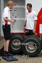 03.04.2009 Kuala Lumpur, Malaysia,  Jarno Trulli (ITA), Toyota Racing looks at Bridestone tyres - Formula 1 World Championship, Rd 2, Malaysian Grand Prix, Friday